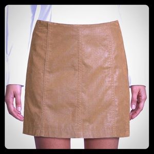 New Free People Faux Mini Skirt in “Cedar.”